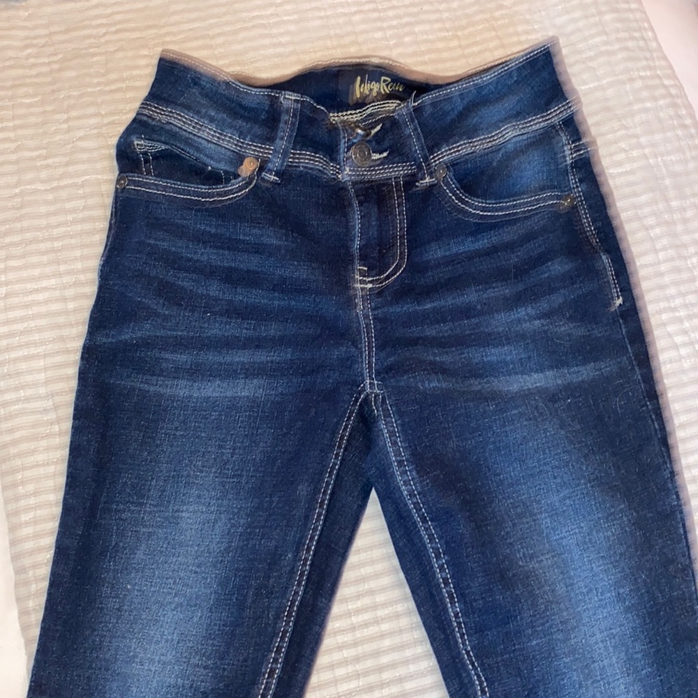 Dark wash skinny jeans.